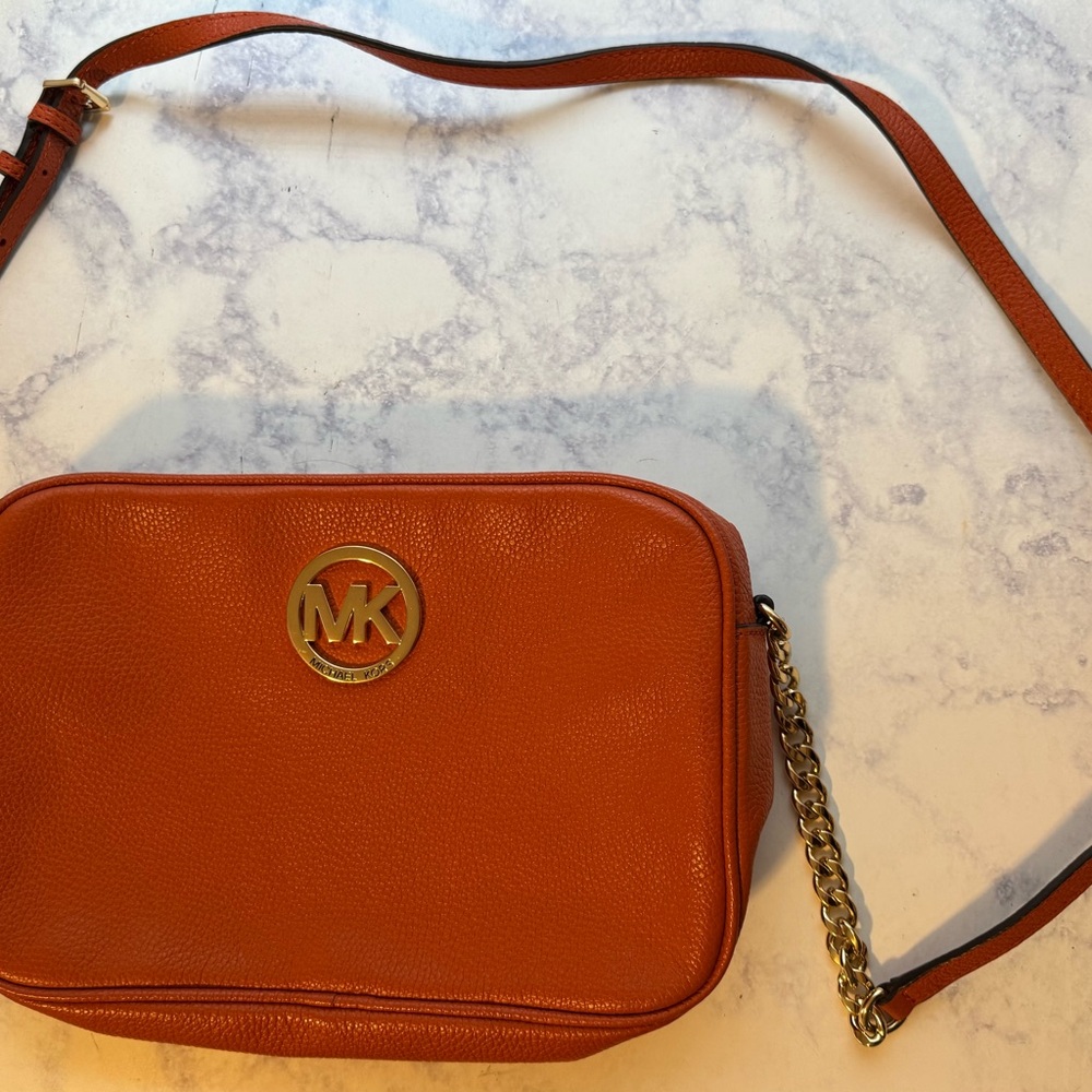 Michael Kors Orange Crossbody Bag with Gold Logo and Adjustable Strap